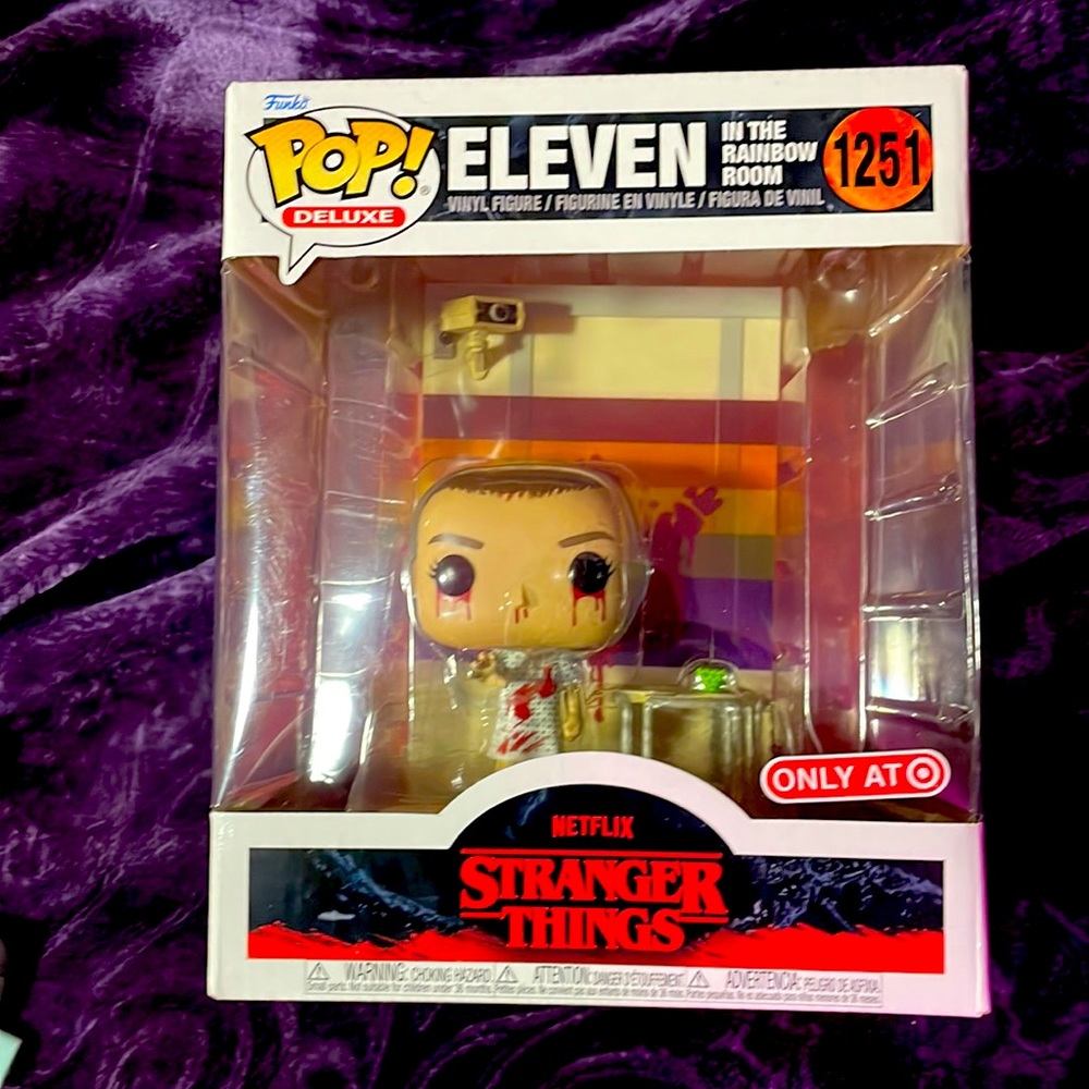 Stranger Things Eleven in the rainbow room.1251